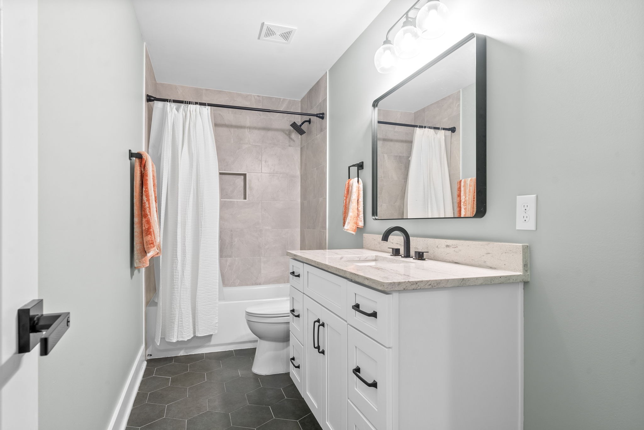 514 Doy Road White Bluff, TN 37187 - Photo 34 of 57 a bathroom with a granite countertop sink mirror vanity and toilet