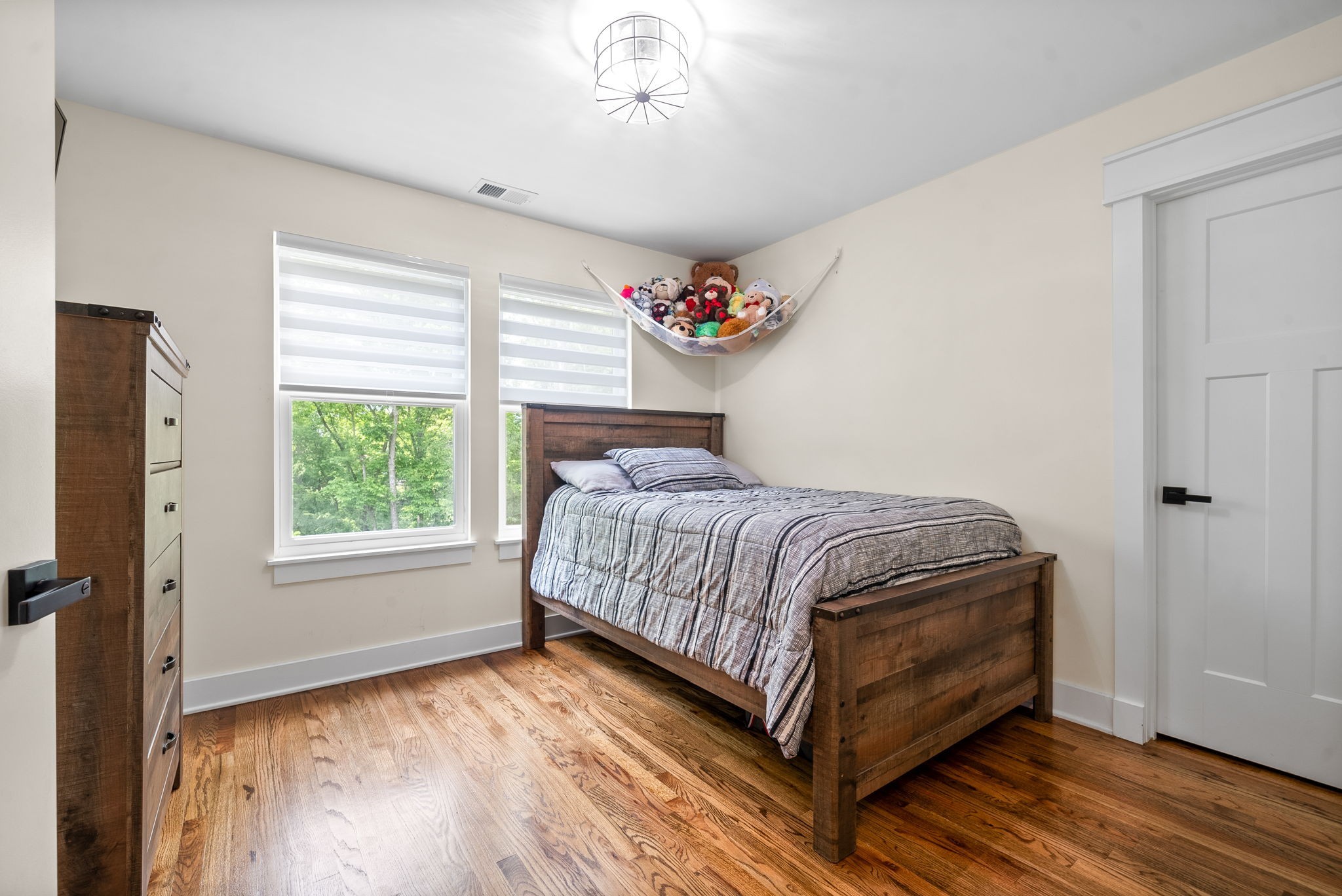 514 Doy Road White Bluff, TN 37187 - Photo 35 of 57 a bedroom with a bed and a window