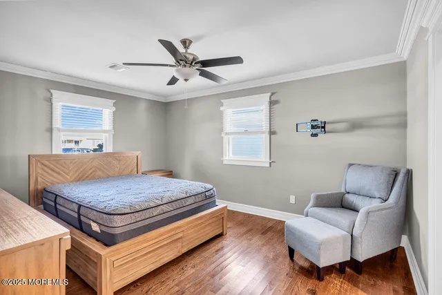 a living room with a bed and a couch