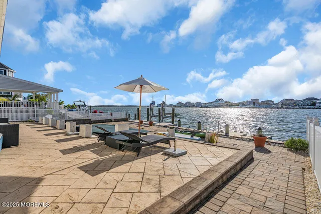 a view of a terrace with furniture