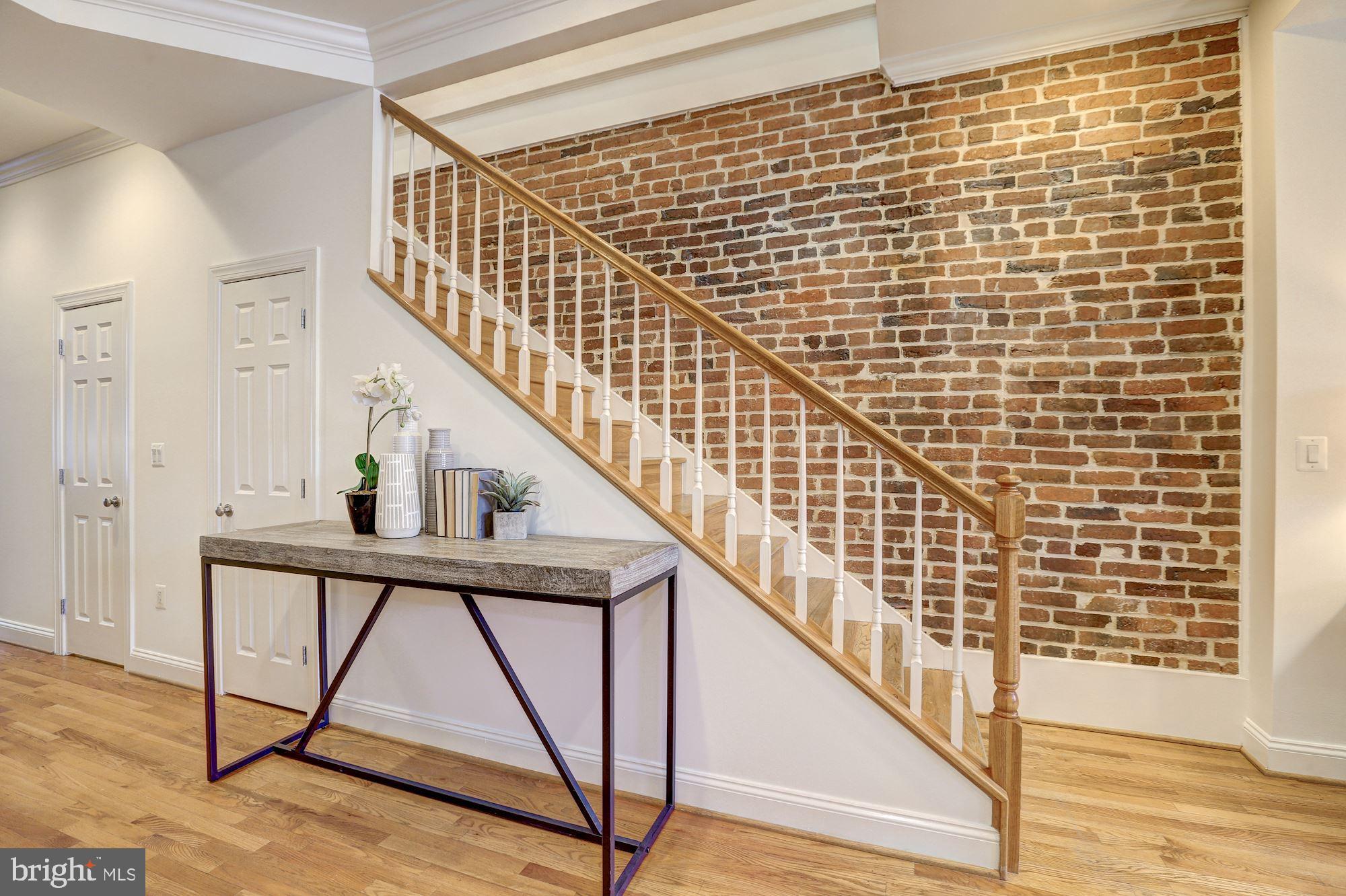 2019 13th Street Northwest Washington, DC 20009 - Photo 10 of 24 Stylish exposed brick walls