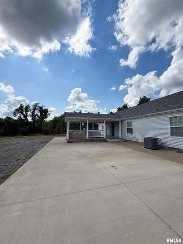 a view of a house with a patio