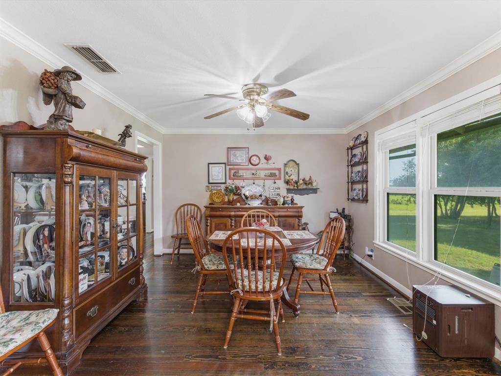 301 Ovilla Road Waxahachie, TX 75167 - Photo 14 of 38 a view of a dining room with furniture window and outside view