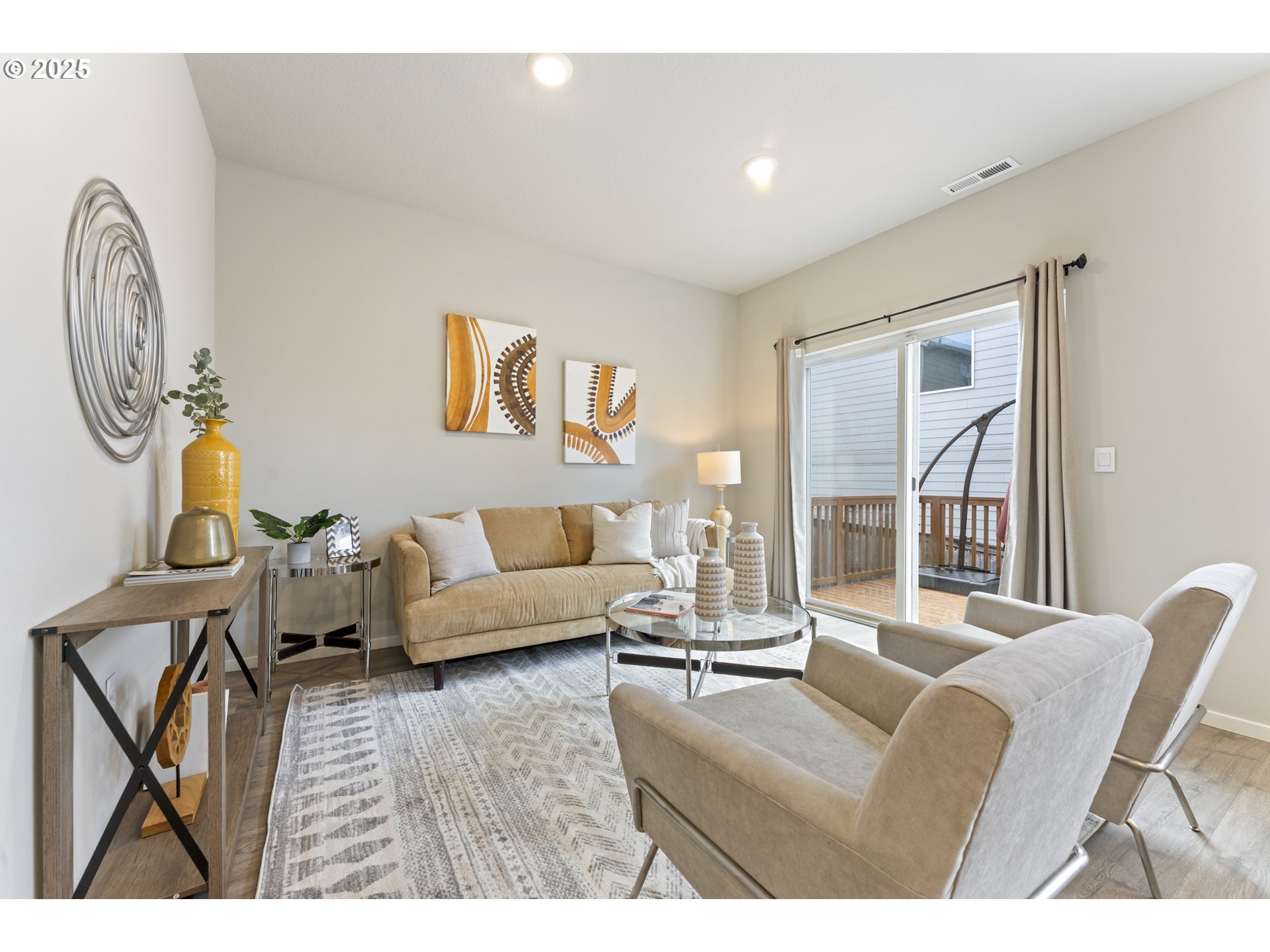 3314 Southwest 42nd Street Gresham, OR 97080 - Photo 13 of 38 a living room with furniture a large window and potted plants