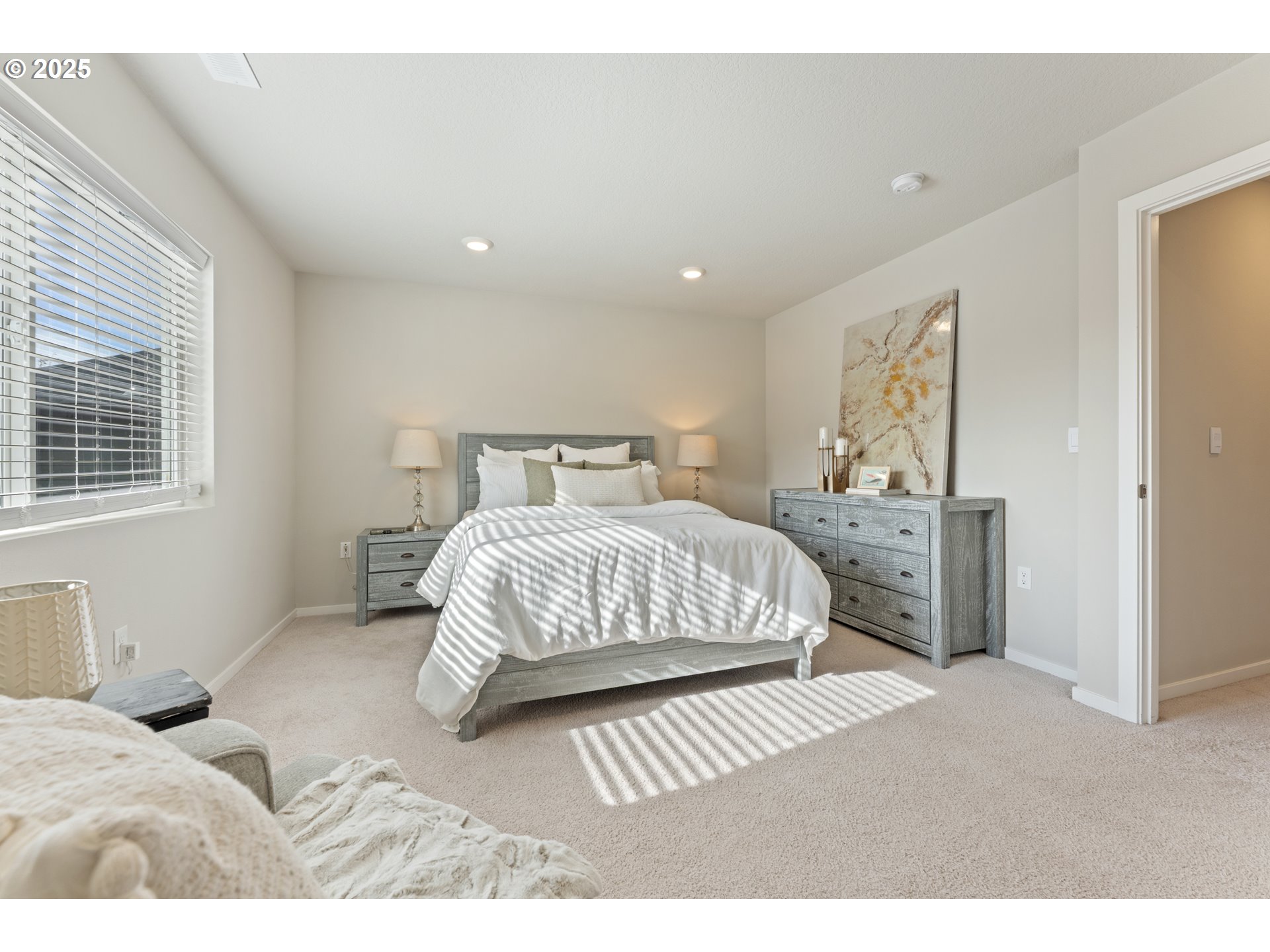 3314 Southwest 42nd Street Gresham, OR 97080 - Photo 22 of 38 a bedroom with a bed and a night stand