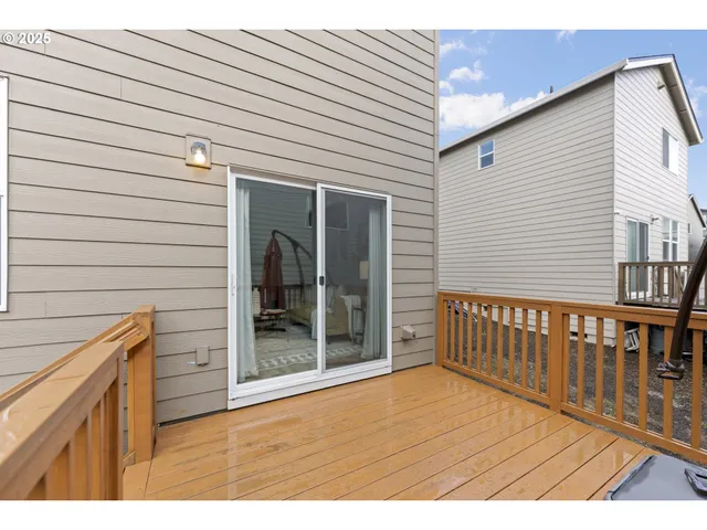 a view of backyard and deck