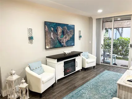 a spacious bedroom with a bed and a couch