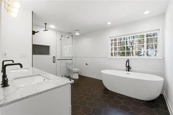 a bathroom with a sink and a bathtub