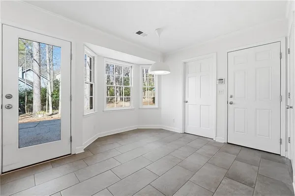 a view of an empty room with window