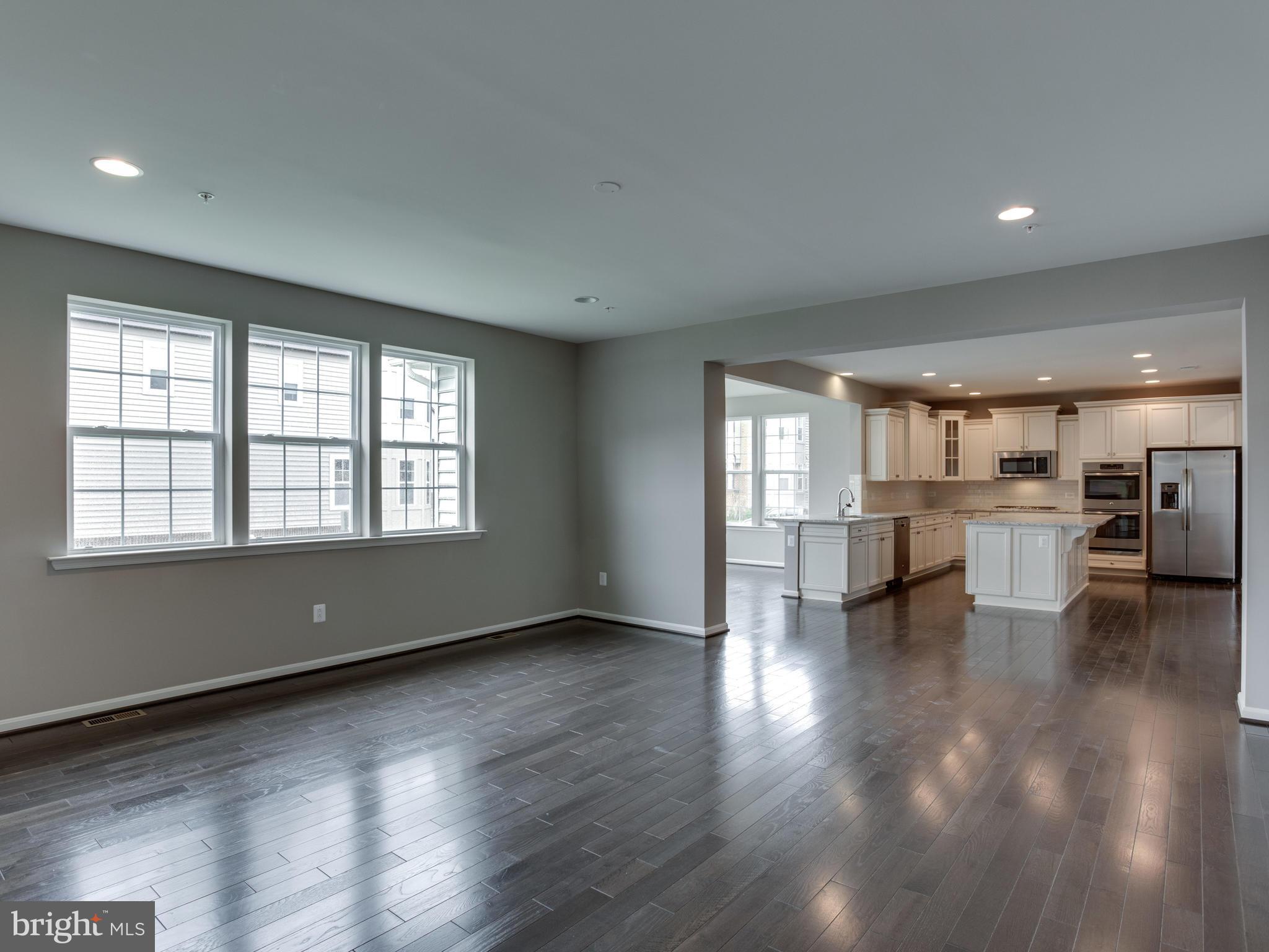 735 Holden Road Frederick, MD 21701 - Photo 14 of 30 a view of kitchen with furniture and wooden floor