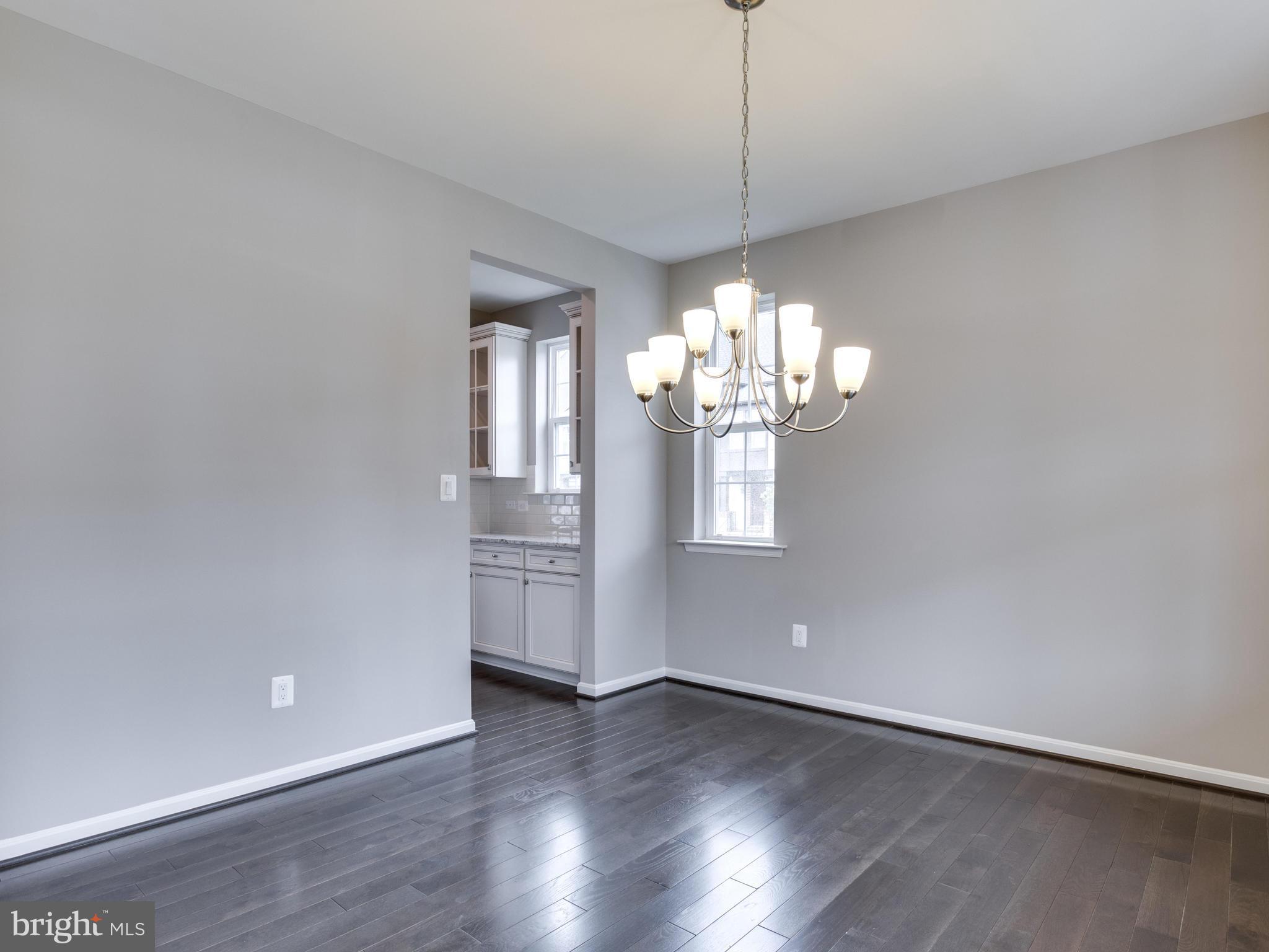 735 Holden Road Frederick, MD 21701 - Photo 4 of 30 a view of a chandelier in a room