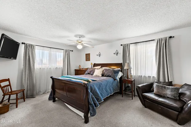 a view of a workspace with furniture and toys