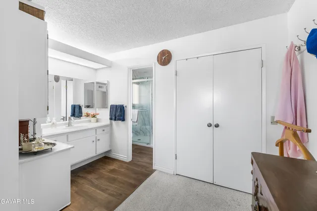 a view of a house with a yard patio and sitting area