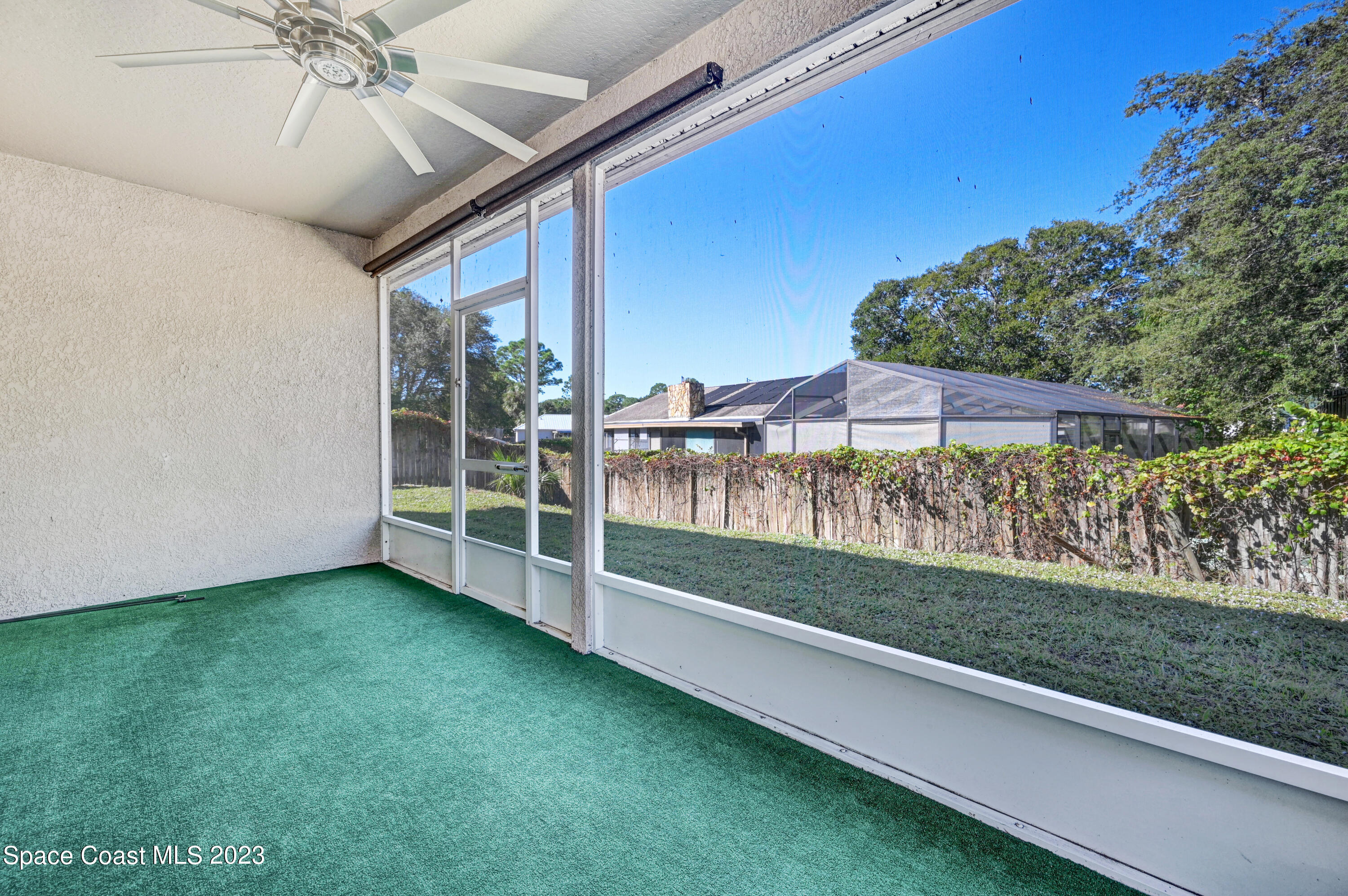 6720 Cairo Road Port St. John, FL 32927 - Photo 19 of 38 a view of a backyard with garden