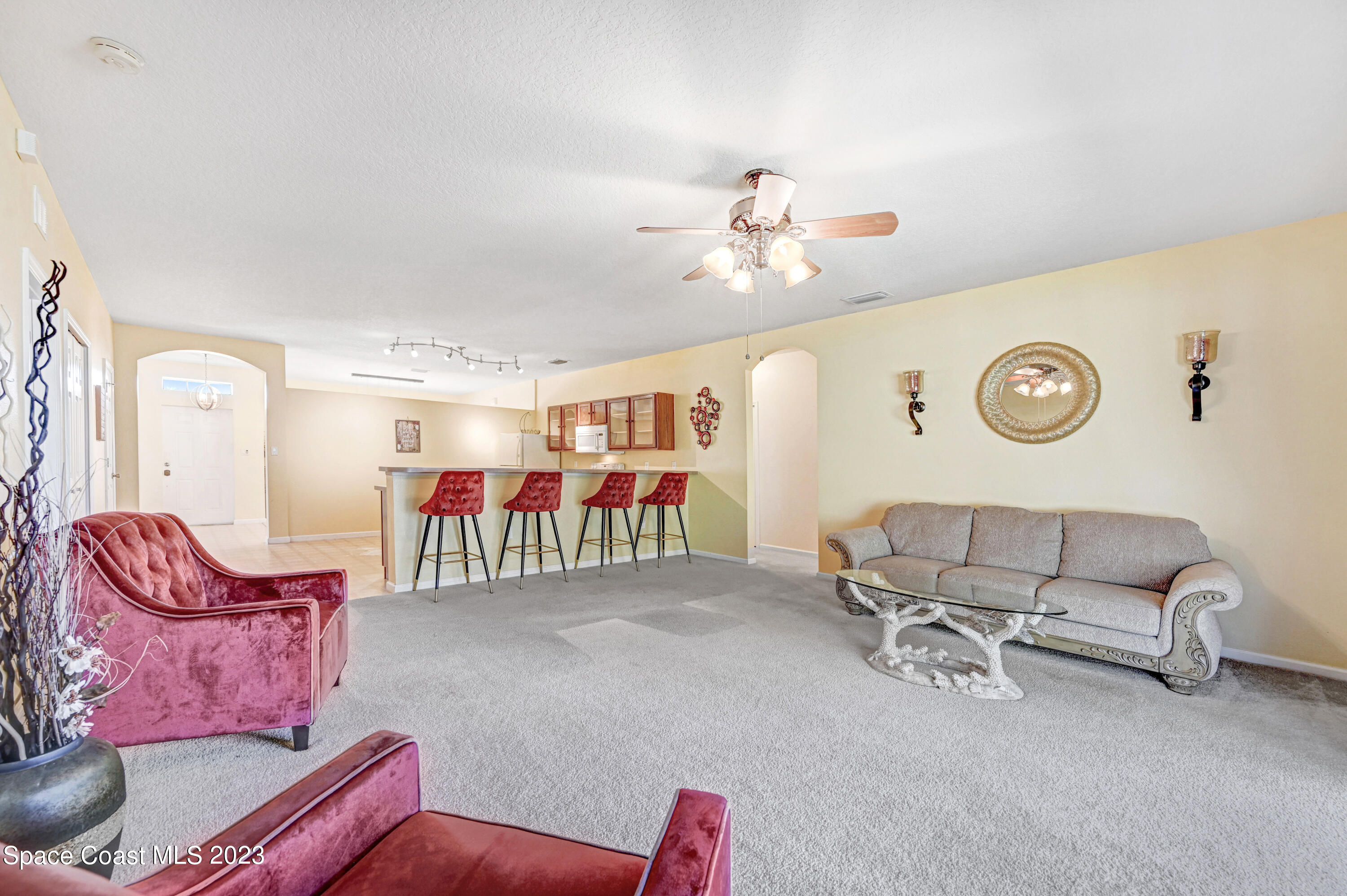 6720 Cairo Road Port St. John, FL 32927 - Photo 26 of 38 a living room with furniture