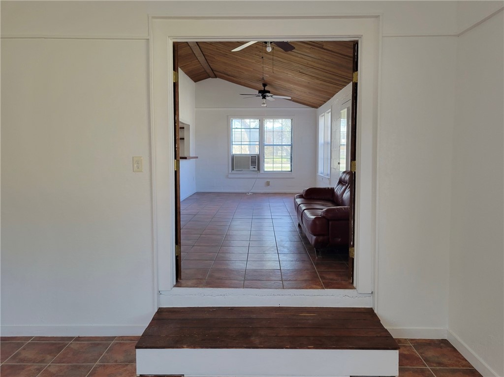 415 8th Street Bandera, TX 78003 - Photo 5 of 13 a view of entryway with wooden floor