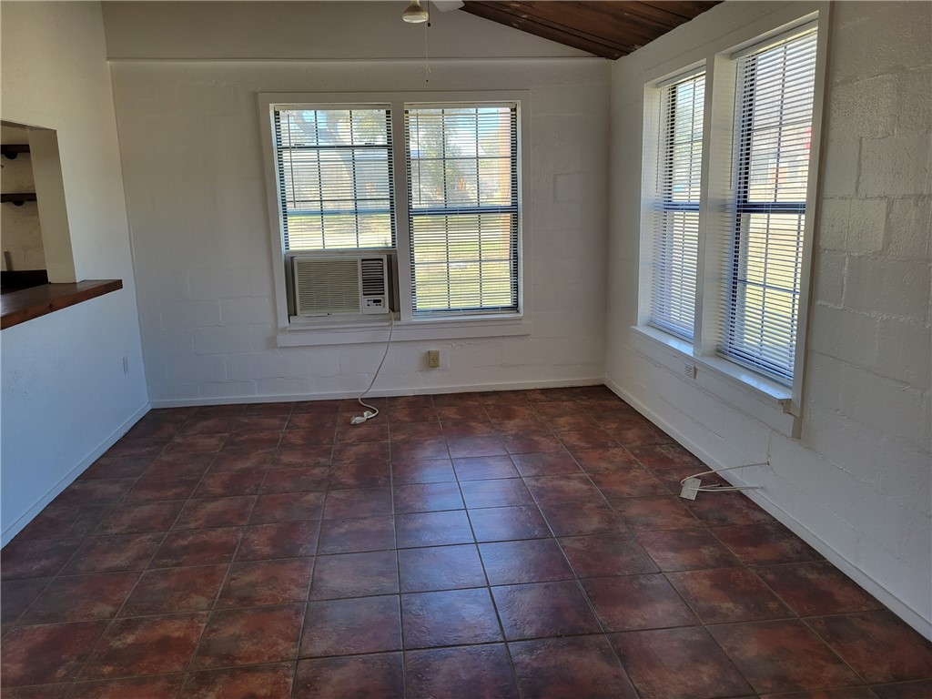415 8th Street Bandera, TX 78003 - Photo 6 of 13 a view of an empty room with a window