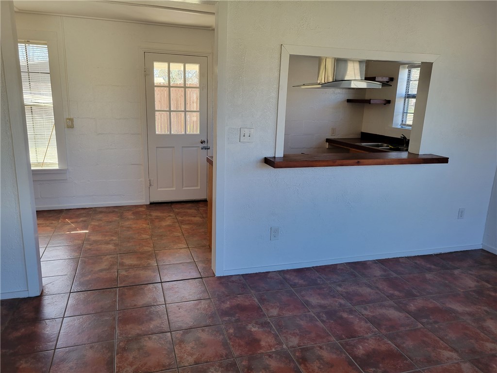 415 8th Street Bandera, TX 78003 - Photo 8 of 13 a room with a window and storage space