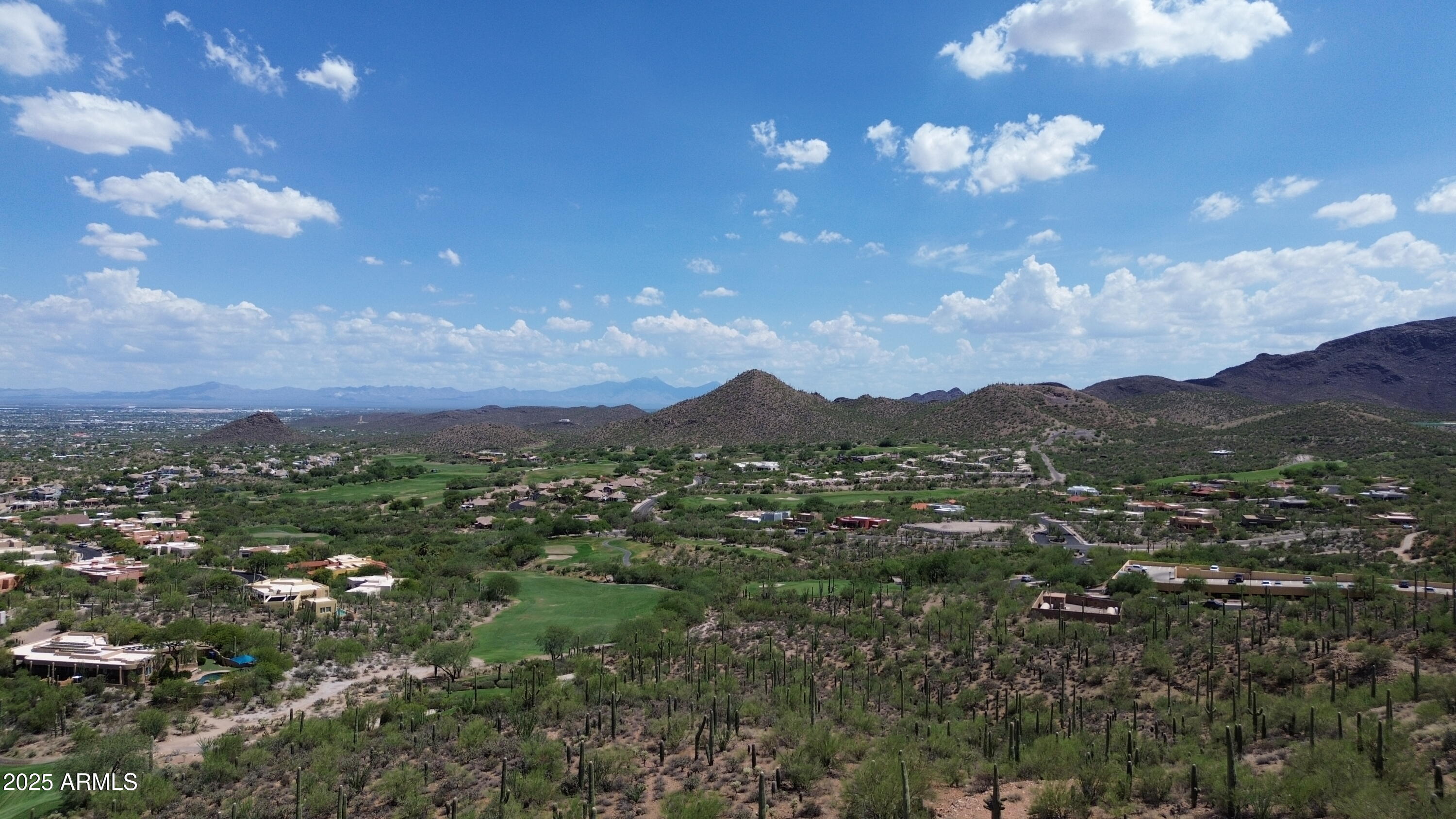 485 South Hotel Service Road Tucson, AZ 85745 - Photo 28 of 38 a view of a city with lots of residential buildings and mountain view in back