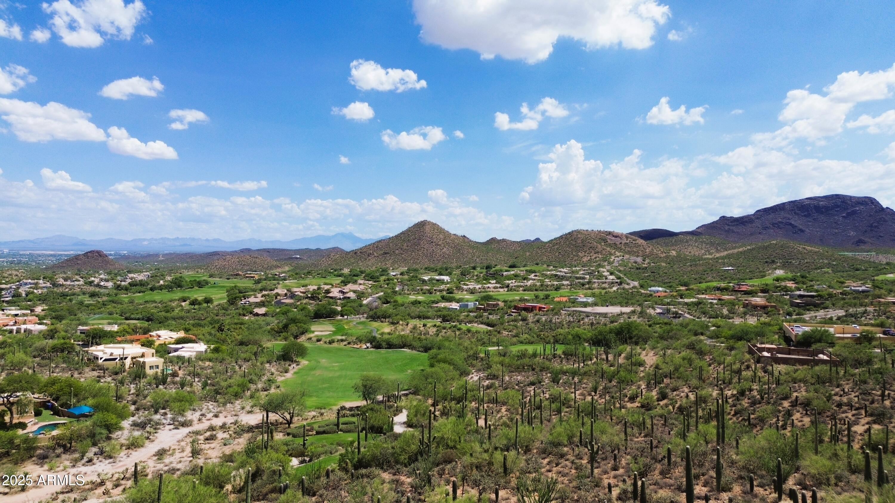 485 South Hotel Service Road Tucson, AZ 85745 - Photo 8 of 38 a view of a city with lush green forest