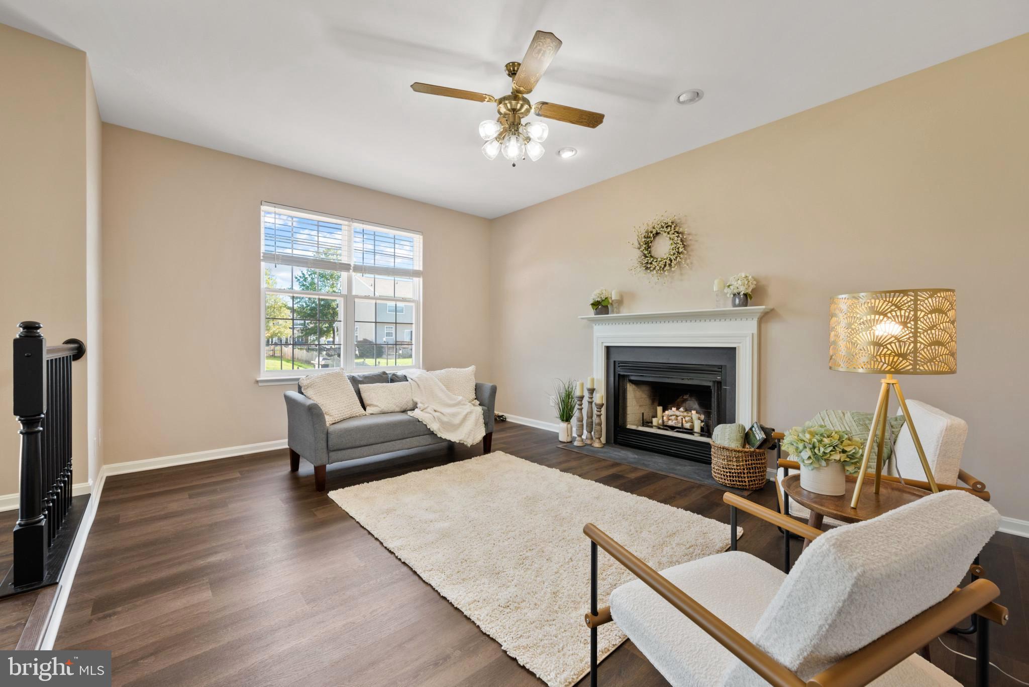 235 Colbert Street Taneytown, MD 21787 - Photo 5 of 18 large gather area with wood fireplace