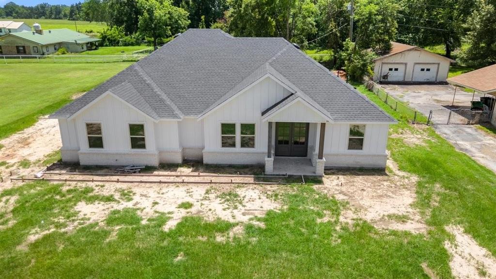 180 Nix Drive Emory, TX 75440 - Photo 13 of 17 a front view of a house with garden