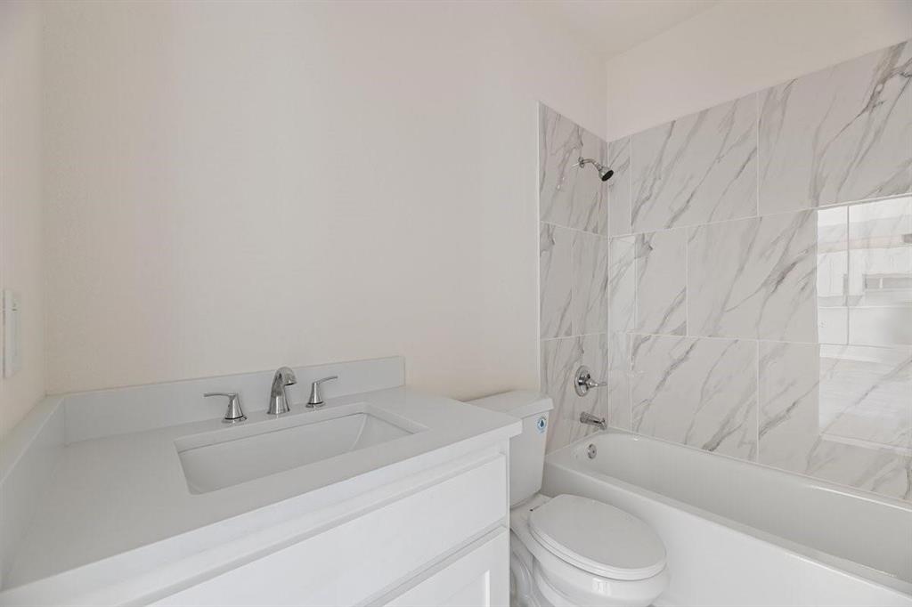 180 Nix Drive Emory, TX 75440 - Photo 7 of 17 a bathroom with a sink toilet and shower