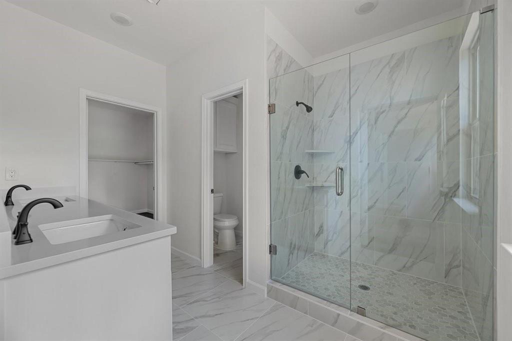 180 Nix Drive Emory, TX 75440 - Photo 10 of 17 a bathroom with a shower and sink