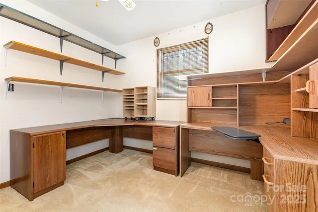 view of a small pool with a yard