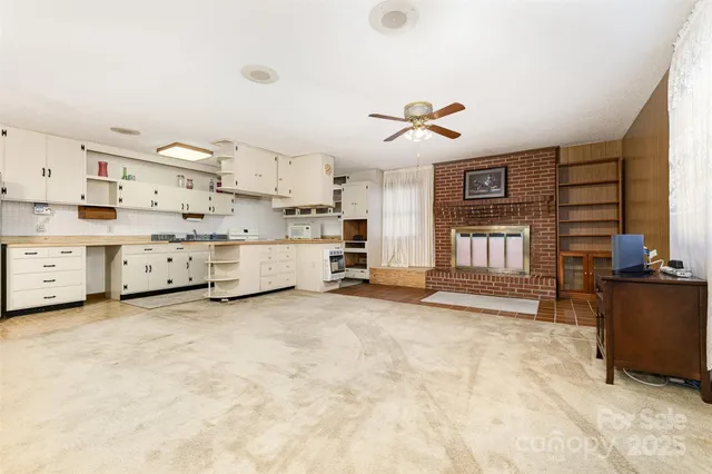 a view of a backyard of the house