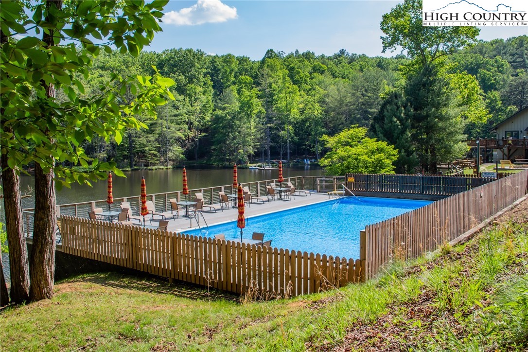 Lot94-95 Roaring Ridge Road Deep Gap, NC 28618 - Photo 10 of 17 a view of a backyard with sitting area