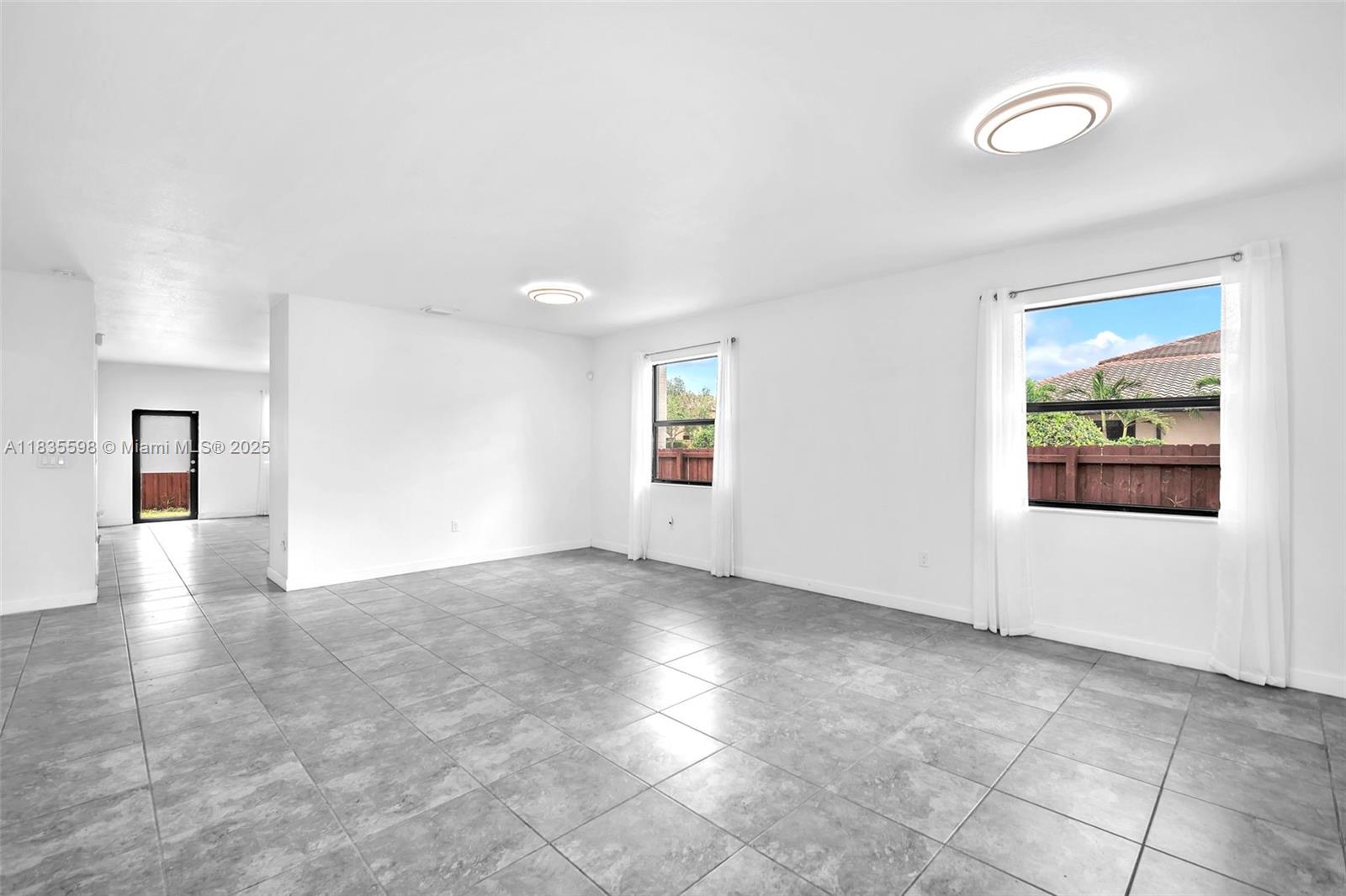11601 Southwest 151st Place Miami, FL 33196 - Photo 4 of 37 Gallery Image 4