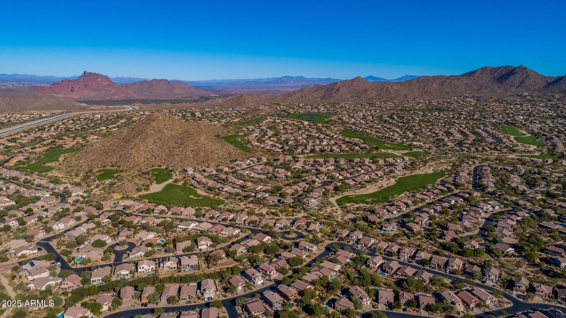 4037 North Pinnacle Hills Circle Mesa, AZ 85207 - Photo 112 of 195 a view of a city with mountains in the background
