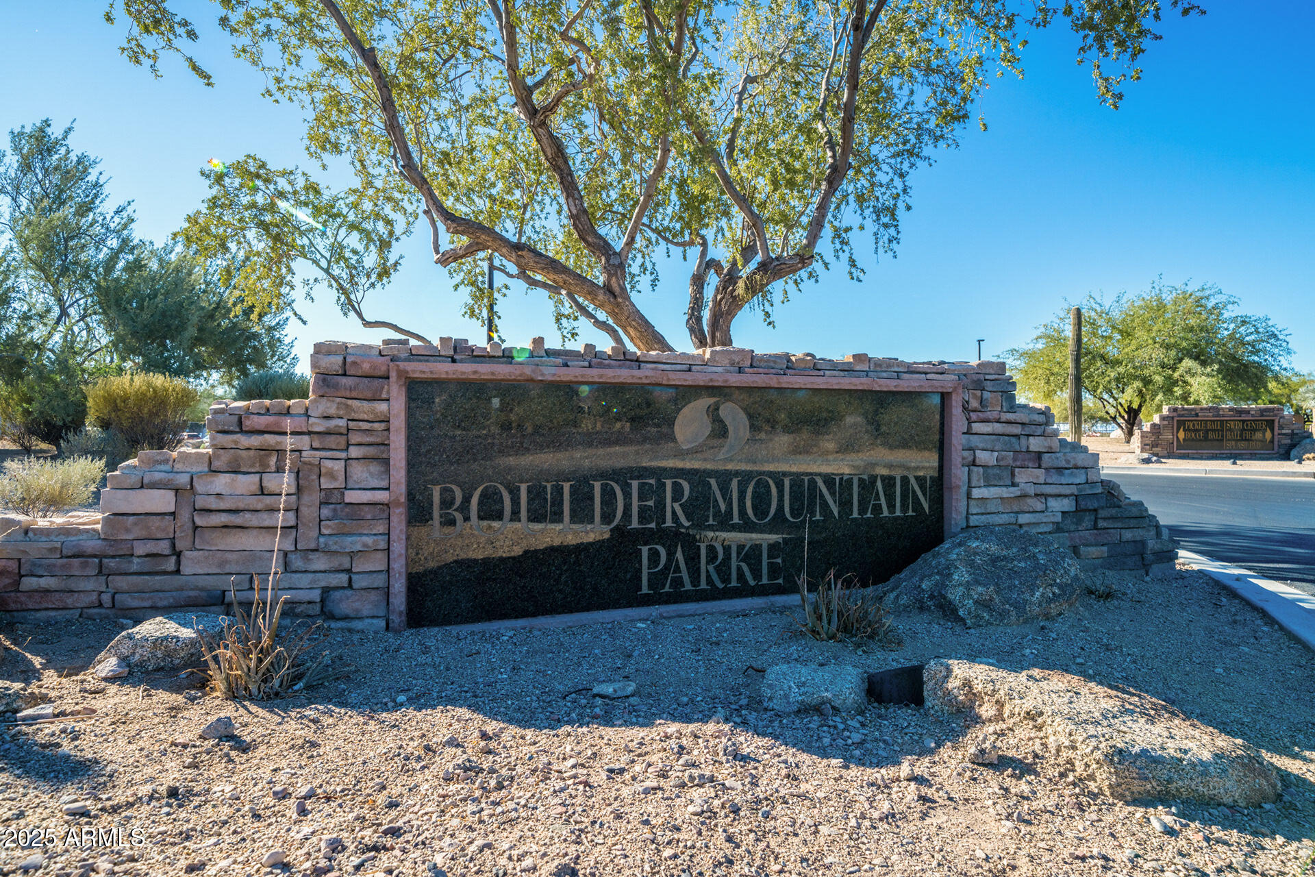 4037 North Pinnacle Hills Circle Mesa, AZ 85207 - Photo 113 of 195 a view of a wooden house with a yard
