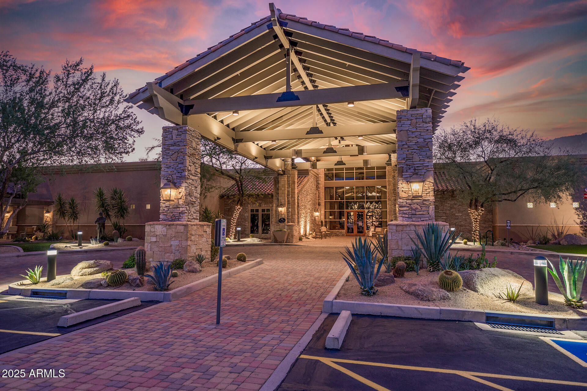 4037 North Pinnacle Hills Circle Mesa, AZ 85207 - Photo 164 of 195 a view of a patio with table and chairs potted plants