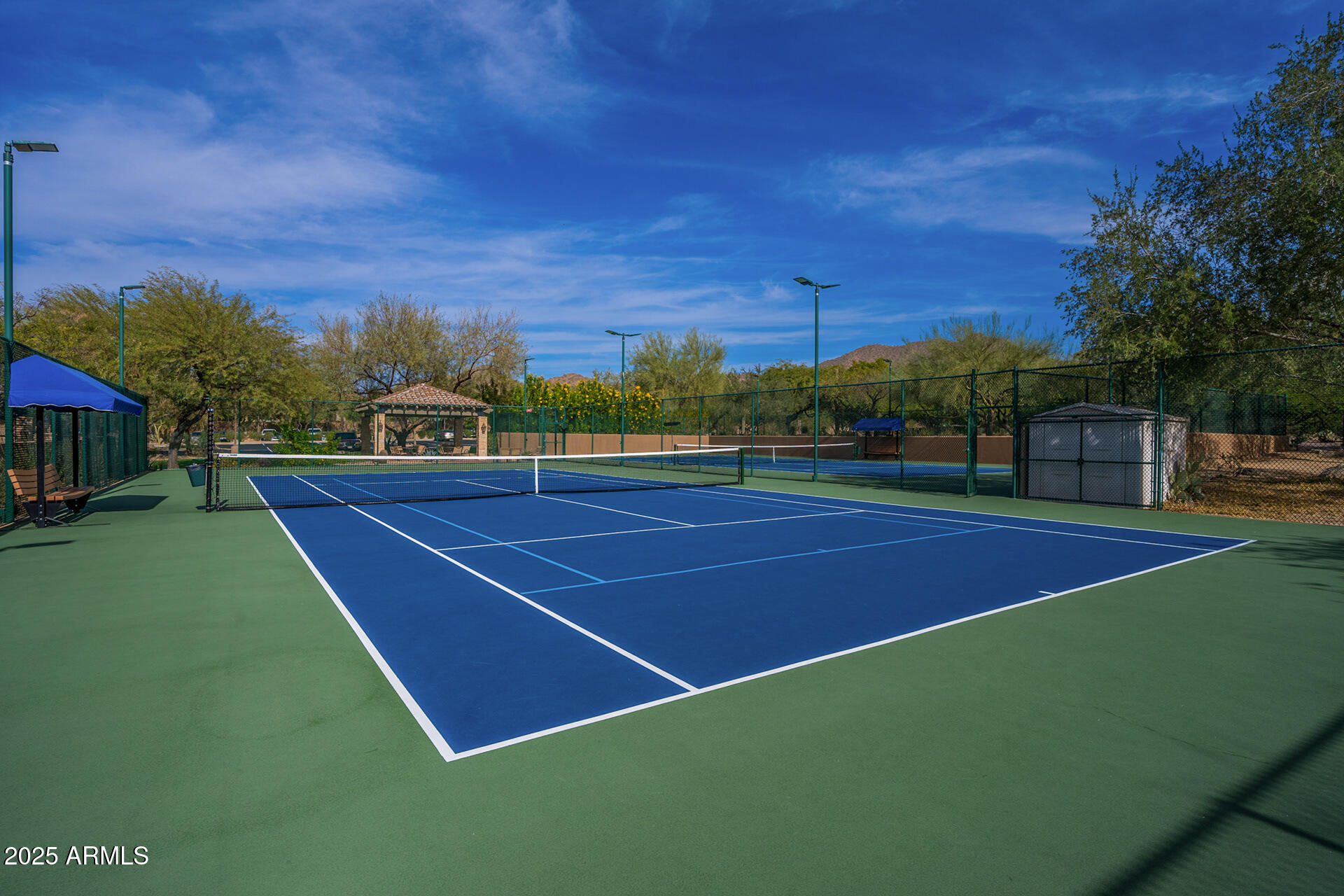 4037 North Pinnacle Hills Circle Mesa, AZ 85207 - Photo 184 of 195 a view of an outdoor space and tennis court