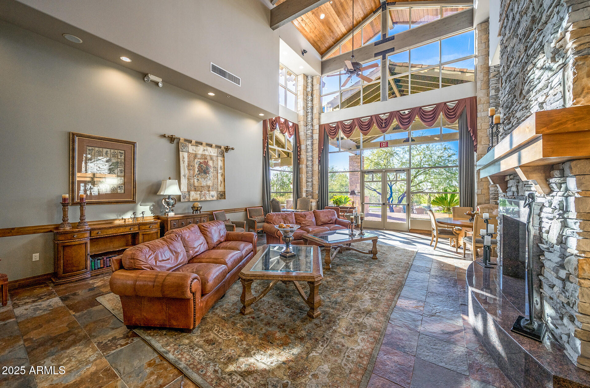 4037 North Pinnacle Hills Circle Mesa, AZ 85207 - Photo 193 of 195 a living room with furniture and a floor to ceiling window