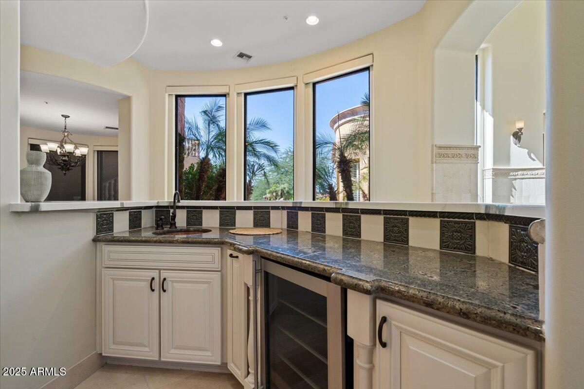4037 North Pinnacle Hills Circle Mesa, AZ 85207 - Photo 43 of 195 a kitchen with stainless steel appliances granite countertop a lot of counter space and a sink
