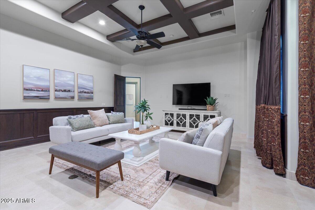 4037 North Pinnacle Hills Circle Mesa, AZ 85207 - Photo 56 of 195 a living room with furniture and a flat screen tv
