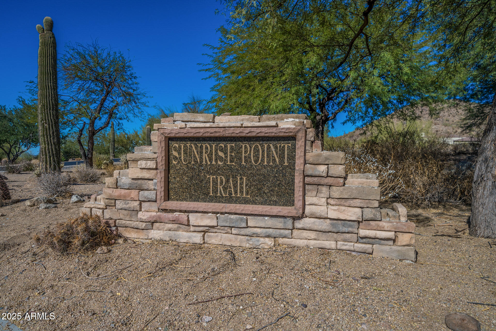 4037 North Pinnacle Hills Circle Mesa, AZ 85207 - Photo 86 of 195 a sign on the side of a road