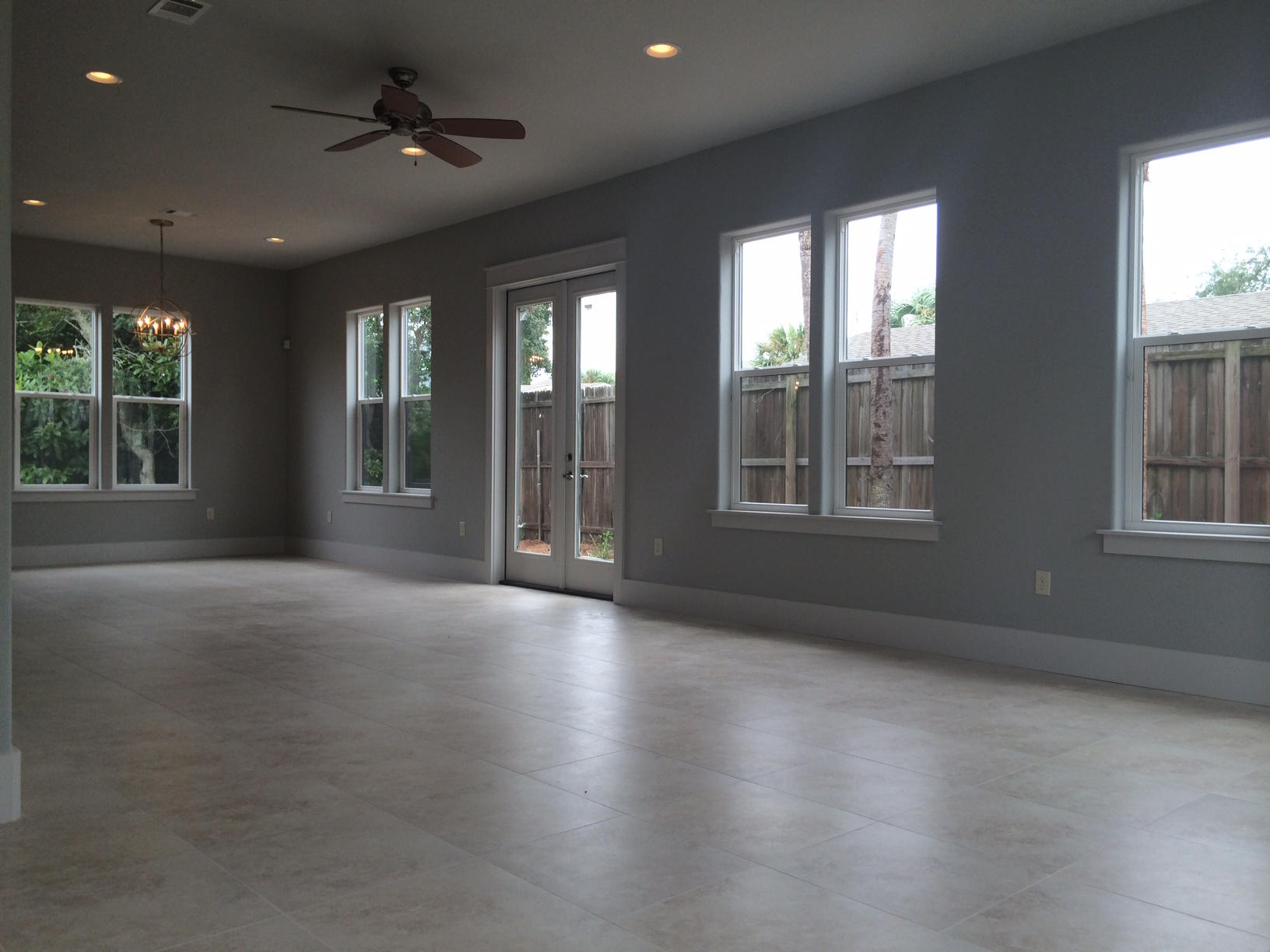 228 Miami Street Miramar Beach, FL 32550 - Photo 2 of 32 a view of an empty room with a window and wooden floor
