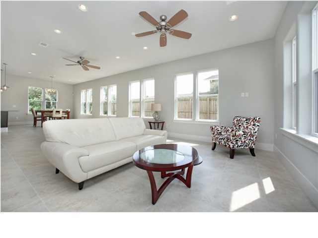 228 Miami Street Miramar Beach, FL 32550 - Photo 11 of 32 a living room with furniture and a chandelier