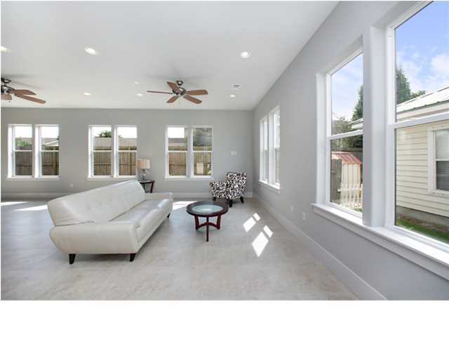 228 Miami Street Miramar Beach, FL 32550 - Photo 14 of 32 a living room with furniture and large windows
