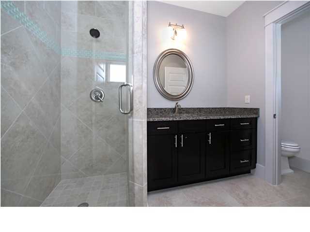 228 Miami Street Miramar Beach, FL 32550 - Photo 23 of 32 a bathroom with a sink a vanity and a mirror
