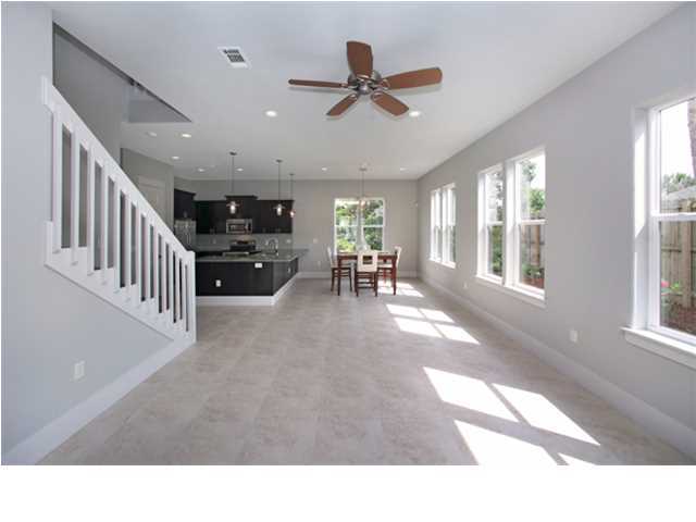 228 Miami Street Miramar Beach, FL 32550 - Photo 27 of 32 a living room with furniture and a large window