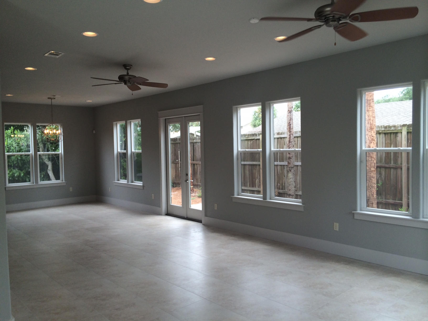 228 Miami Street Miramar Beach, FL 32550 - Photo 4 of 32 a view of an empty room with a window and a kitchen