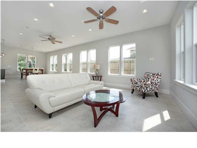 228 Miami Street Miramar Beach, FL 32550 - Photo 6 of 32 a living room with furniture and a large window