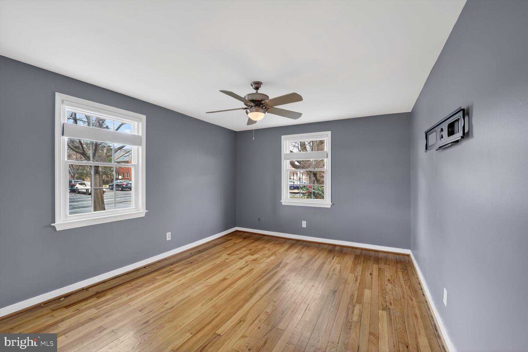2248 Washington Avenue, Unit 101 Silver Spring, MD 20910 - Photo 23 of 23 wooden floor in an empty room with a window