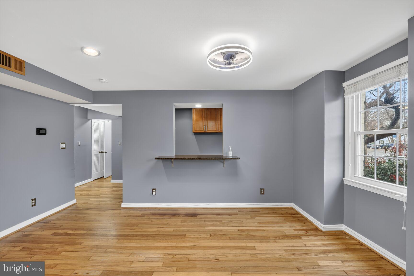 2248 Washington Avenue, Unit 101 Silver Spring, MD 20910 - Photo 5 of 23 a view of an empty room with a window
