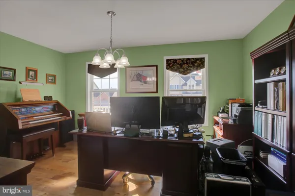 a room with furniture and a chandelier